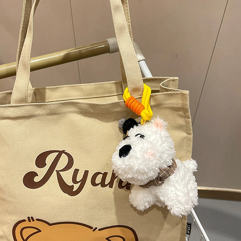 Kleiner Hunde-Kuscheltier-Schlüsselanhänger für die Tasche