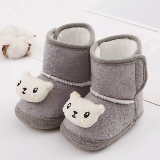 Babyschuhe mit Cartoon-Motiv