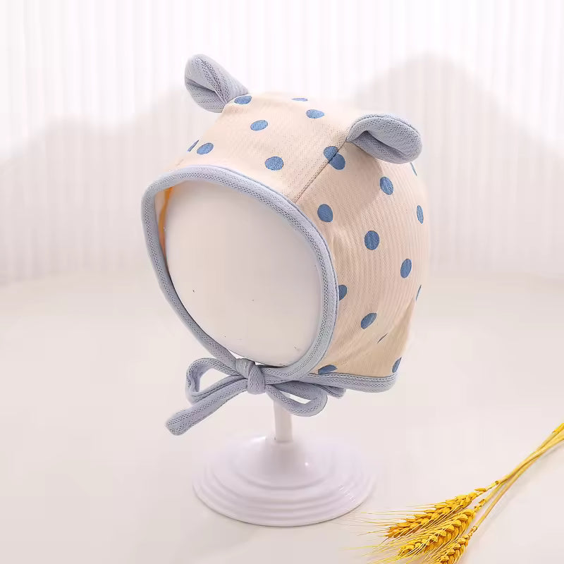 Baby winter hat with ears and polka dot print