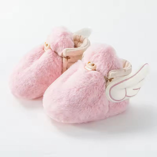 Niedliche Babyflügelschuhe